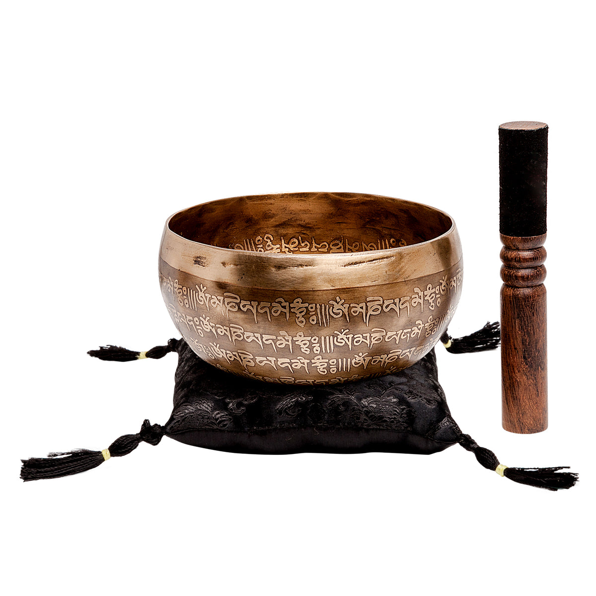 Etched singing bowl showing Sanskrit inscription detail