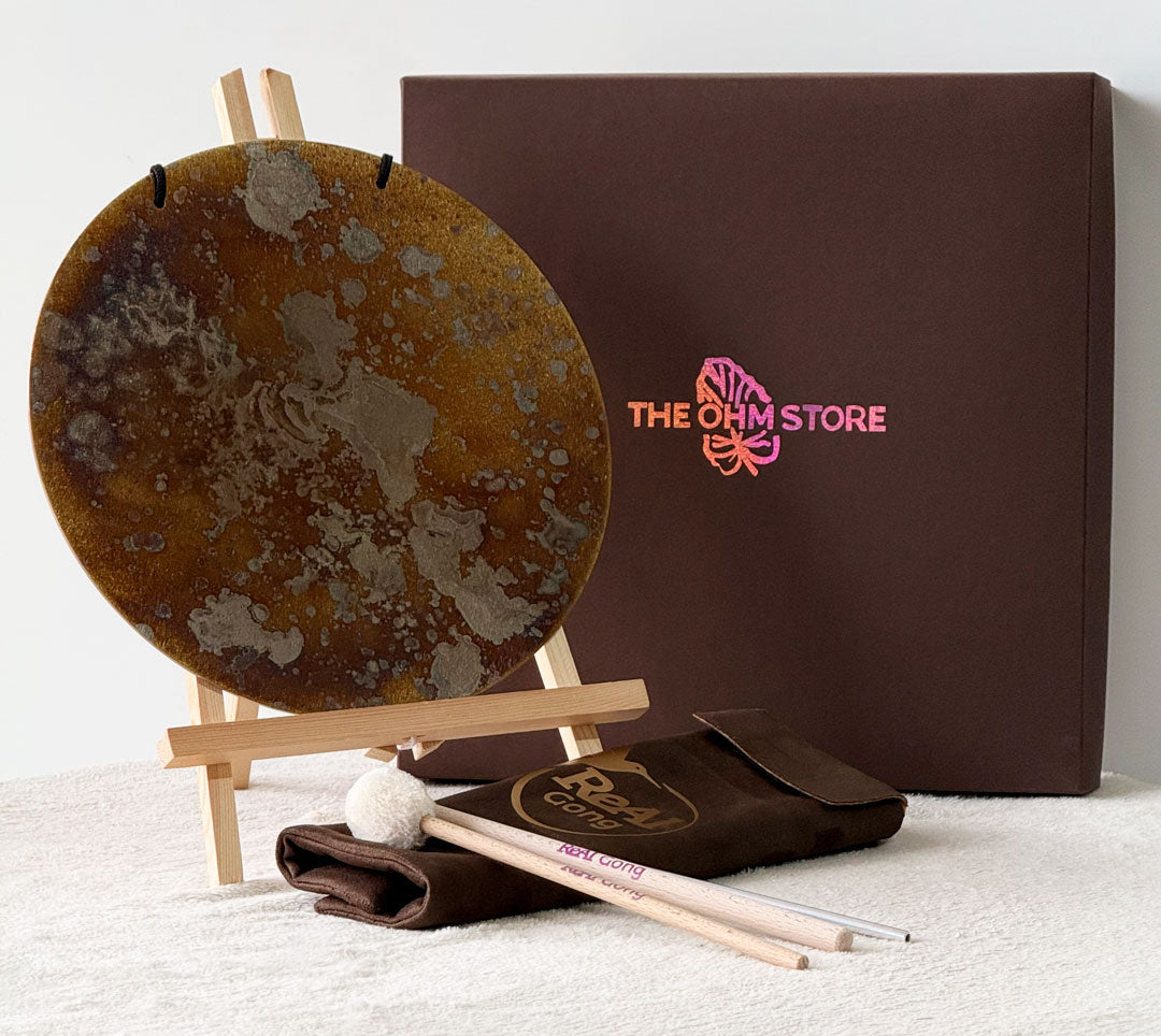 Circle Gong Plate 11 inch on an easel with The Ohm Store presentation box and three mallets