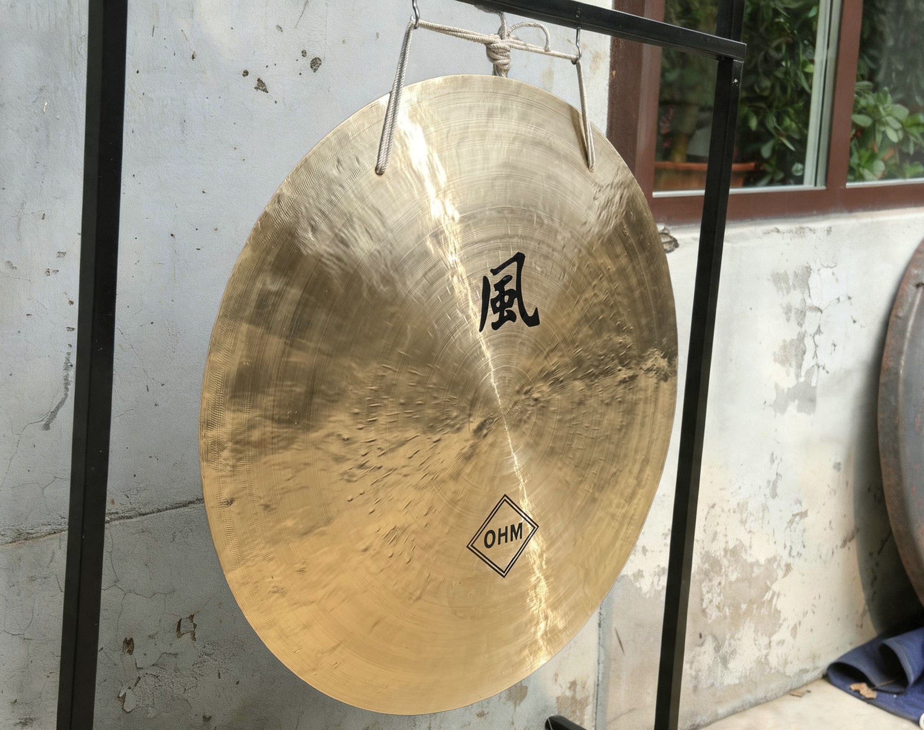 Close view of the 36 inch Ohm Wind Gong bronze surface